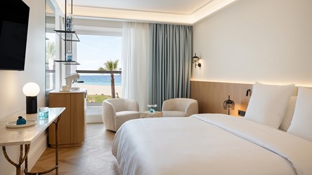 2549_07-newly-designed-rooms-and-suites-feature-open-plan-layouts-custom-room-bars-and-the-best-views-of-the-cretan-sea.jpg
