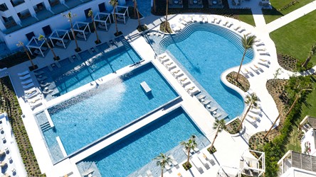 2549_26-at-the-heart-of-the-resort-four-overflowing-pools-in-the-bluest-blue.jpg